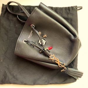 Yves Saint Laurent Monogramme Bourse Mini embellished leather bucket bag